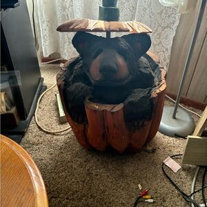 Carved Bear in Wooden Stump Decor